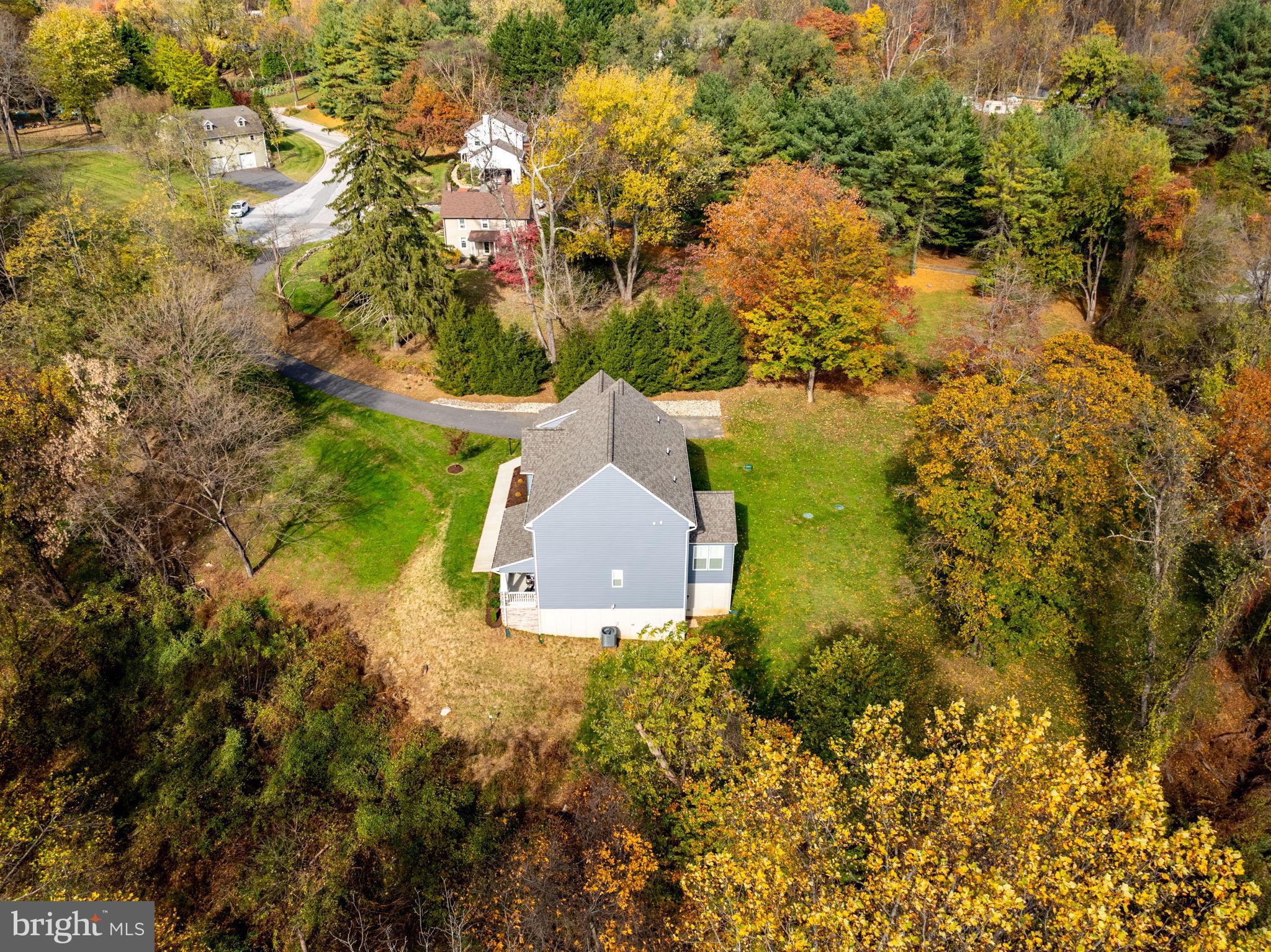 424 Osage Road Cockeysville, MD 21030 - Photo 50 of 52 an aerial view of a house with yard and green space