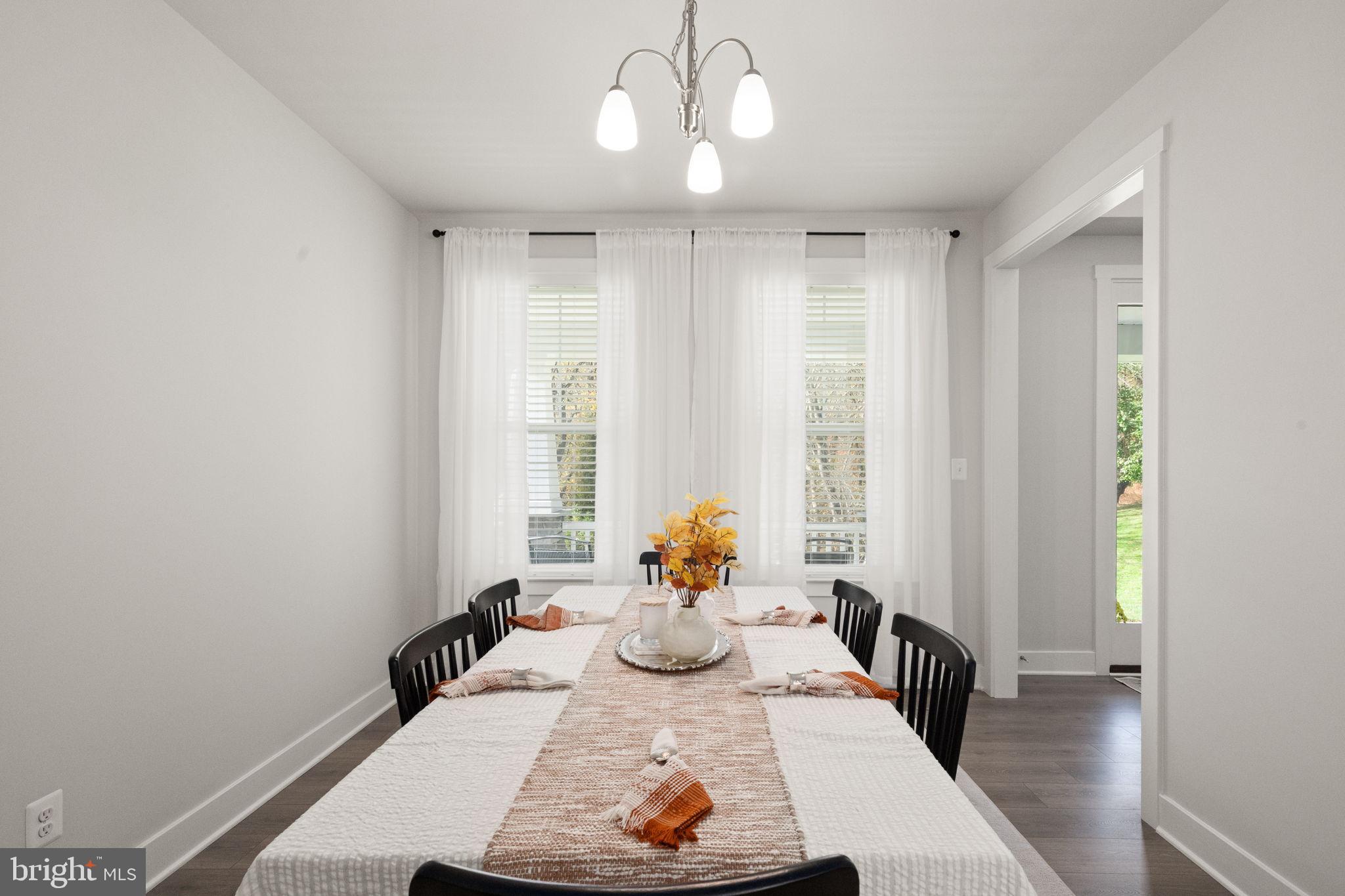 424 Osage Road Cockeysville, MD 21030 - Photo 7 of 52 a view of a dining room with furniture window and wooden floor