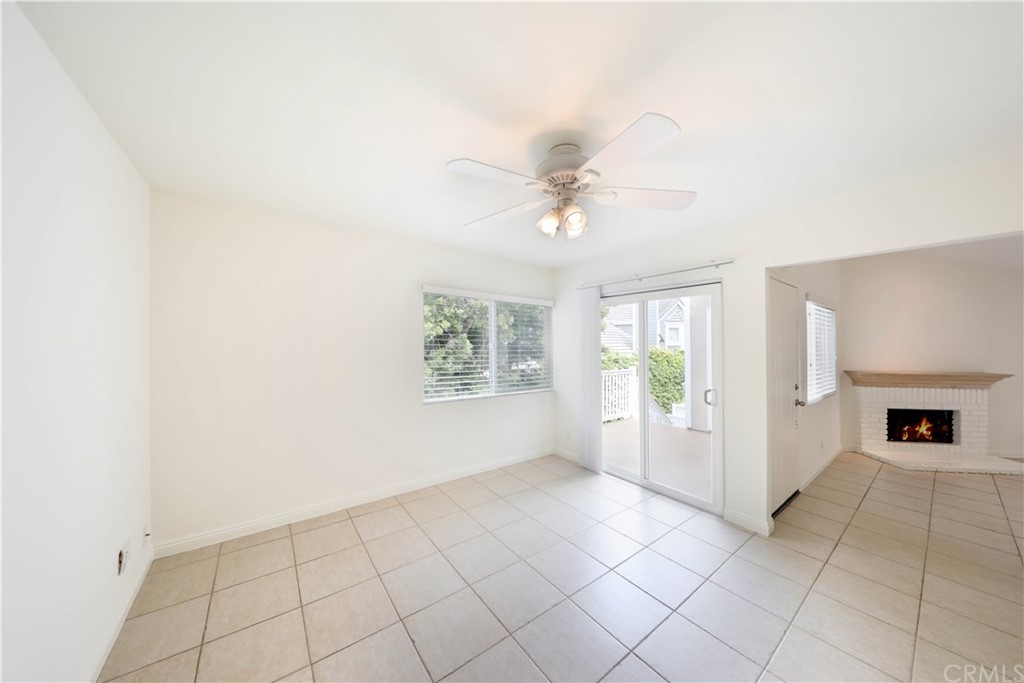 34004 Selva Road, Unit 377 Dana Point, CA 92629 - Photo 15 of 19 an empty room with windows and fan