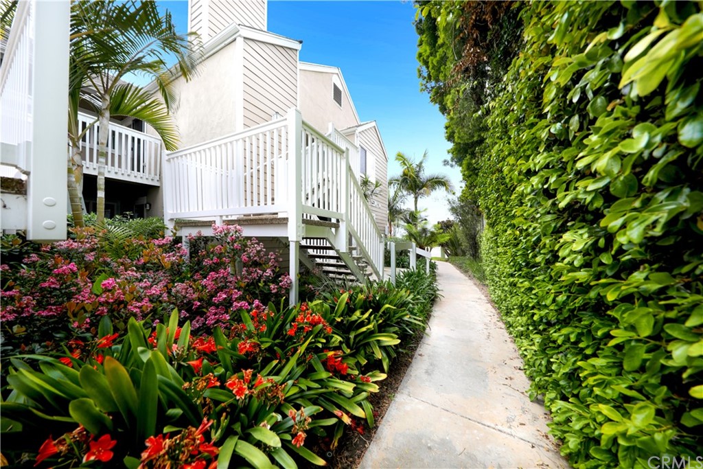 34004 Selva Road, Unit 377 Dana Point, CA 92629 - Photo 19 of 19 a view of a pathway with flowers