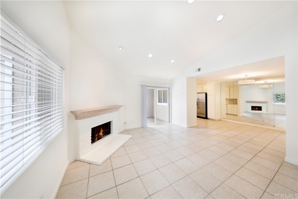 34004 Selva Road, Unit 377 Dana Point, CA 92629 - Photo 3 of 19 a view of a livingroom with a fireplace