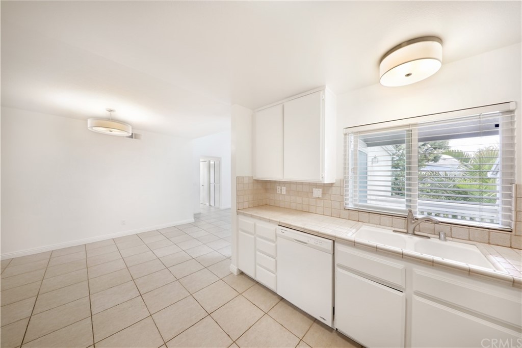 34004 Selva Road, Unit 377 Dana Point, CA 92629 - Photo 7 of 19 a kitchen with a sink cabinets and a window