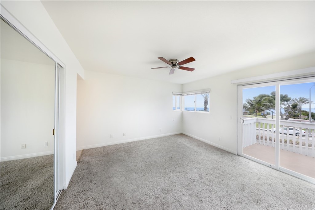 34004 Selva Road, Unit 377 Dana Point, CA 92629 - Photo 10 of 19 an empty room with a empty space and windows