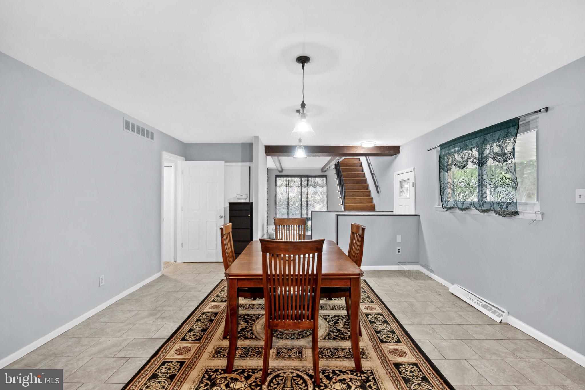 609 Foster Road Cheltenham, PA 19012 - Photo 10 of 44 Inviting dining space with natural light.