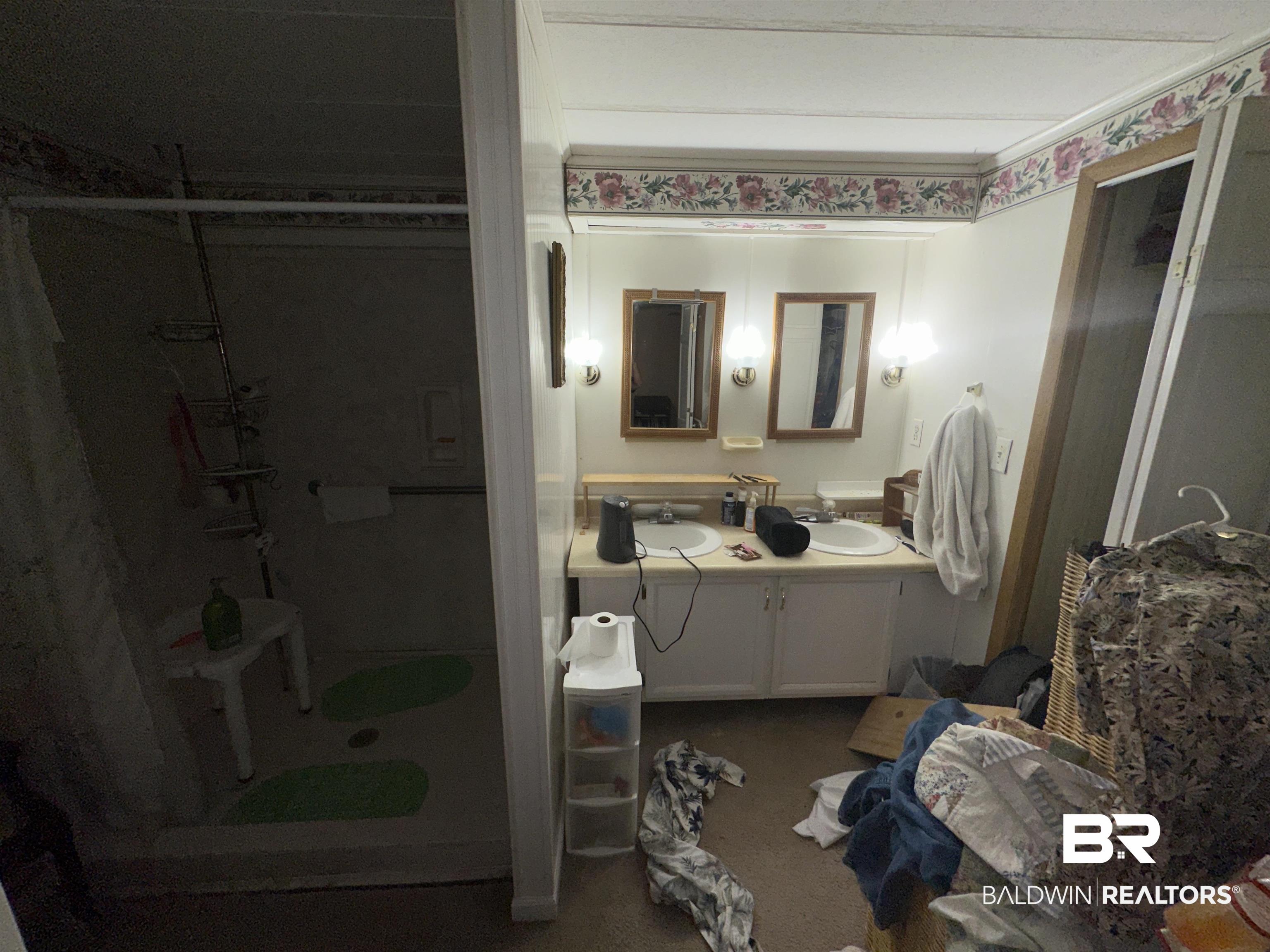 1850 Repoll Drive Mobile, AL 36695 - Photo 24 of 26 Bathroom with a shower and vanity