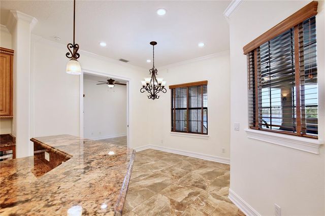 a view of hallway with wooden floor