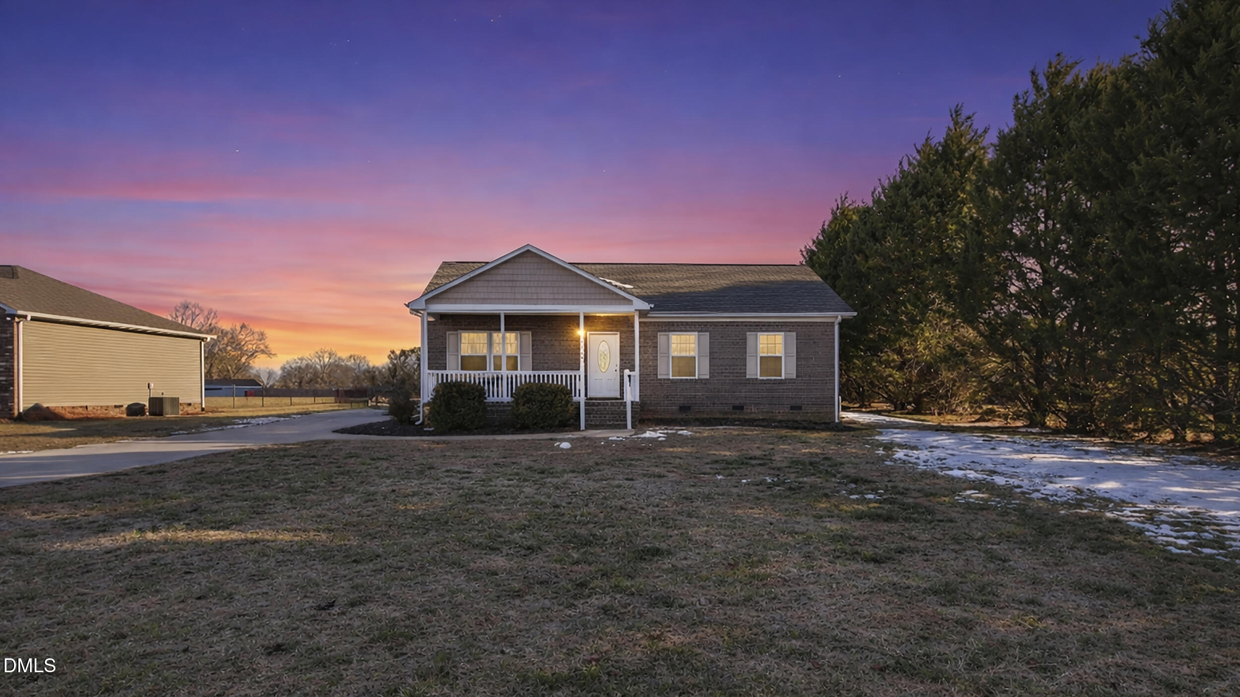 5930 Old 421 Road Liberty, NC 27298 - Photo 2 of 42 a front view of a house with a yard