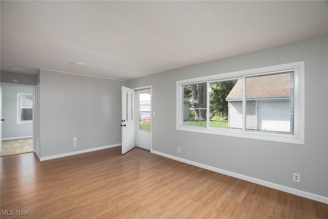 4782 Belle Meadow Road Mentor, OH 44060 - Photo 13 of 22 Unfurnished room featuring light wood-type flooring