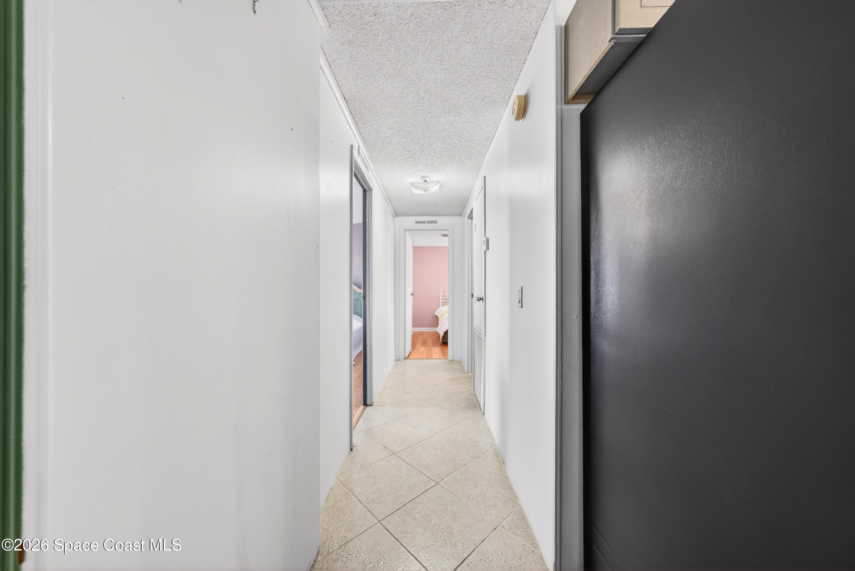 7645 Chasta Road Micco, FL 32976 - Photo 15 of 39 a view of a hallway