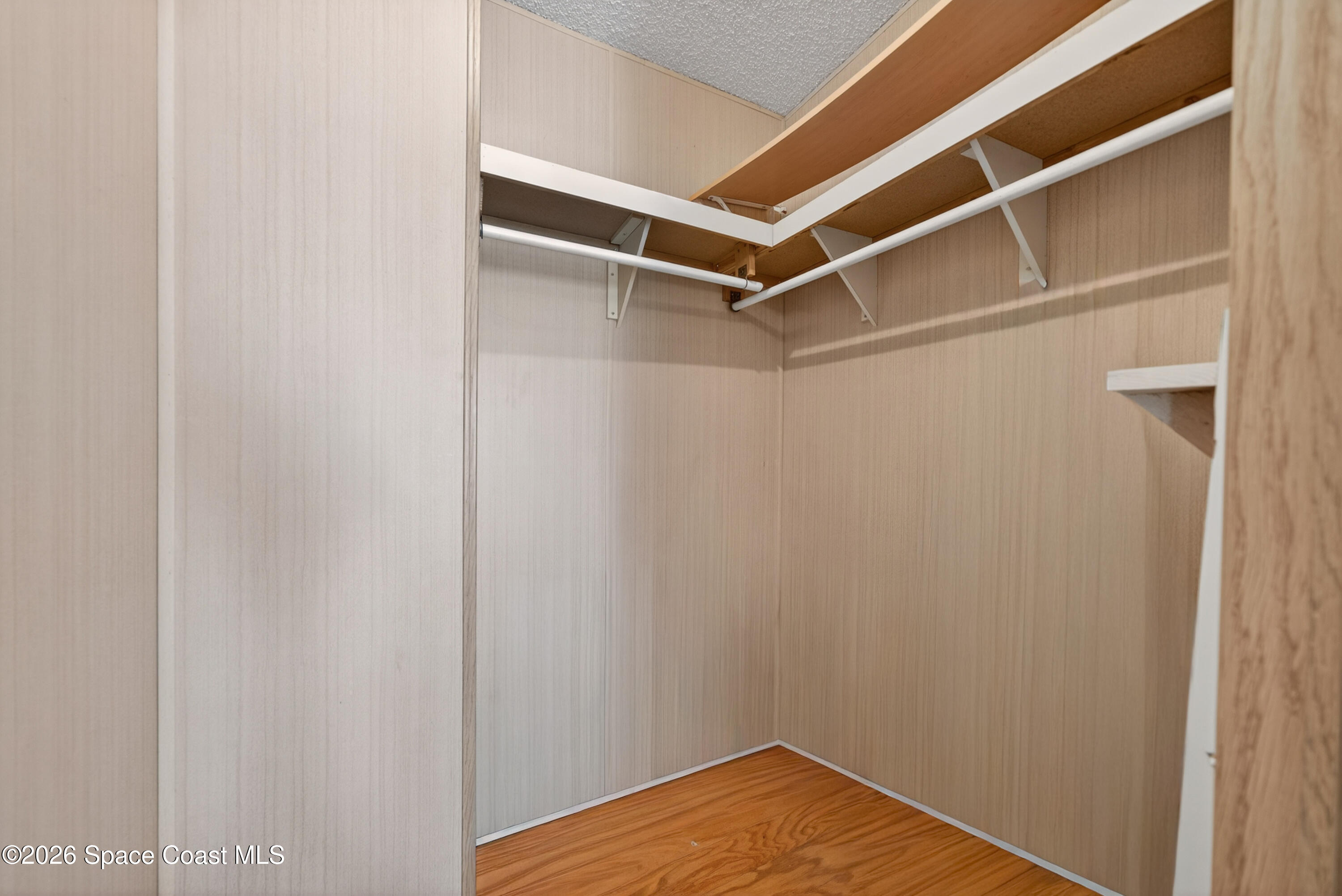 7645 Chasta Road Micco, FL 32976 - Photo 20 of 39 a view of an empty walk in closet