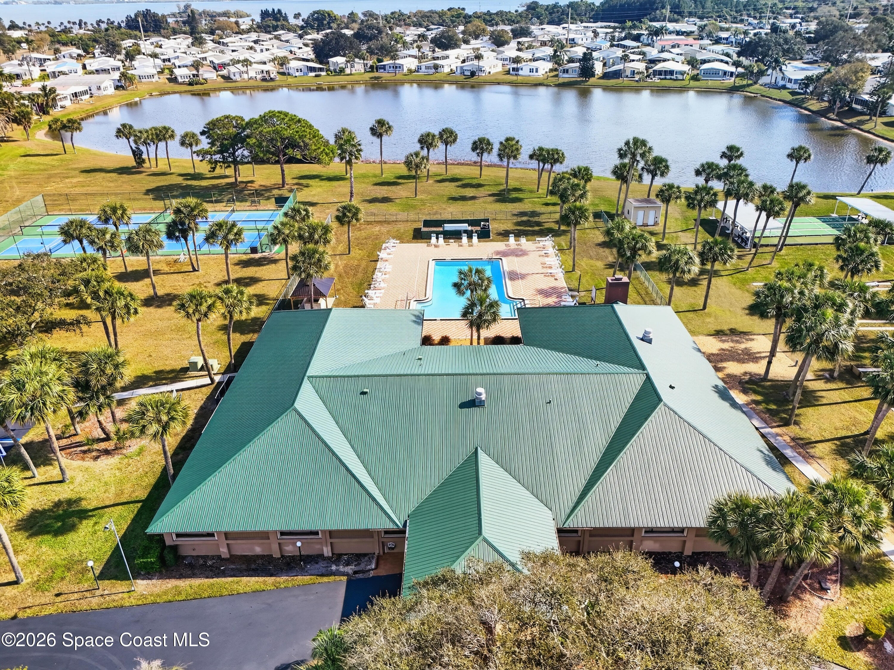 7645 Chasta Road Micco, FL 32976 - Photo 33 of 39 an aerial view of a houses with outdoor space