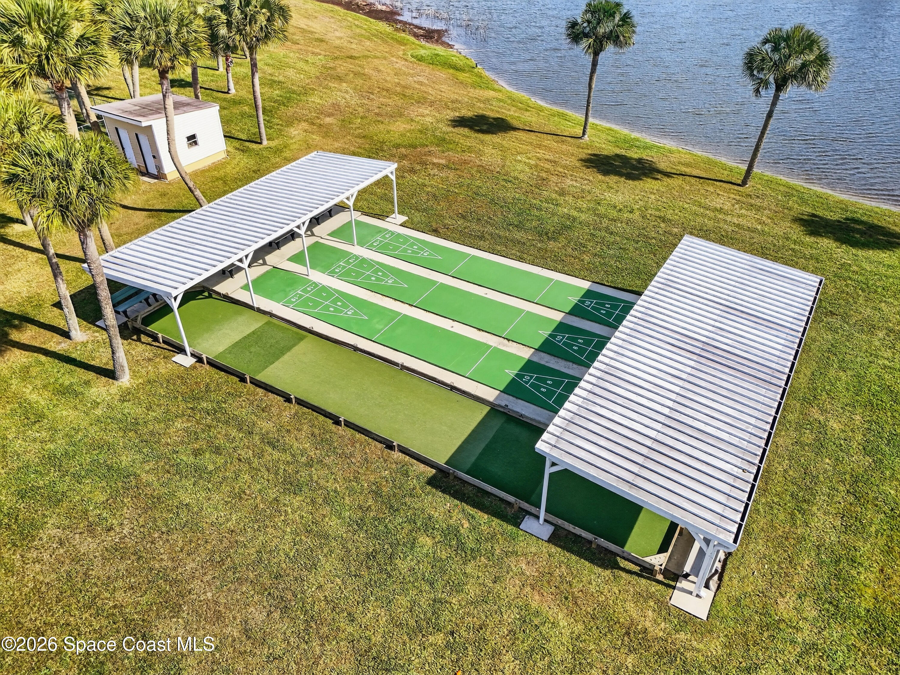 7645 Chasta Road Micco, FL 32976 - Photo 34 of 39 a view of a backyard with chairs