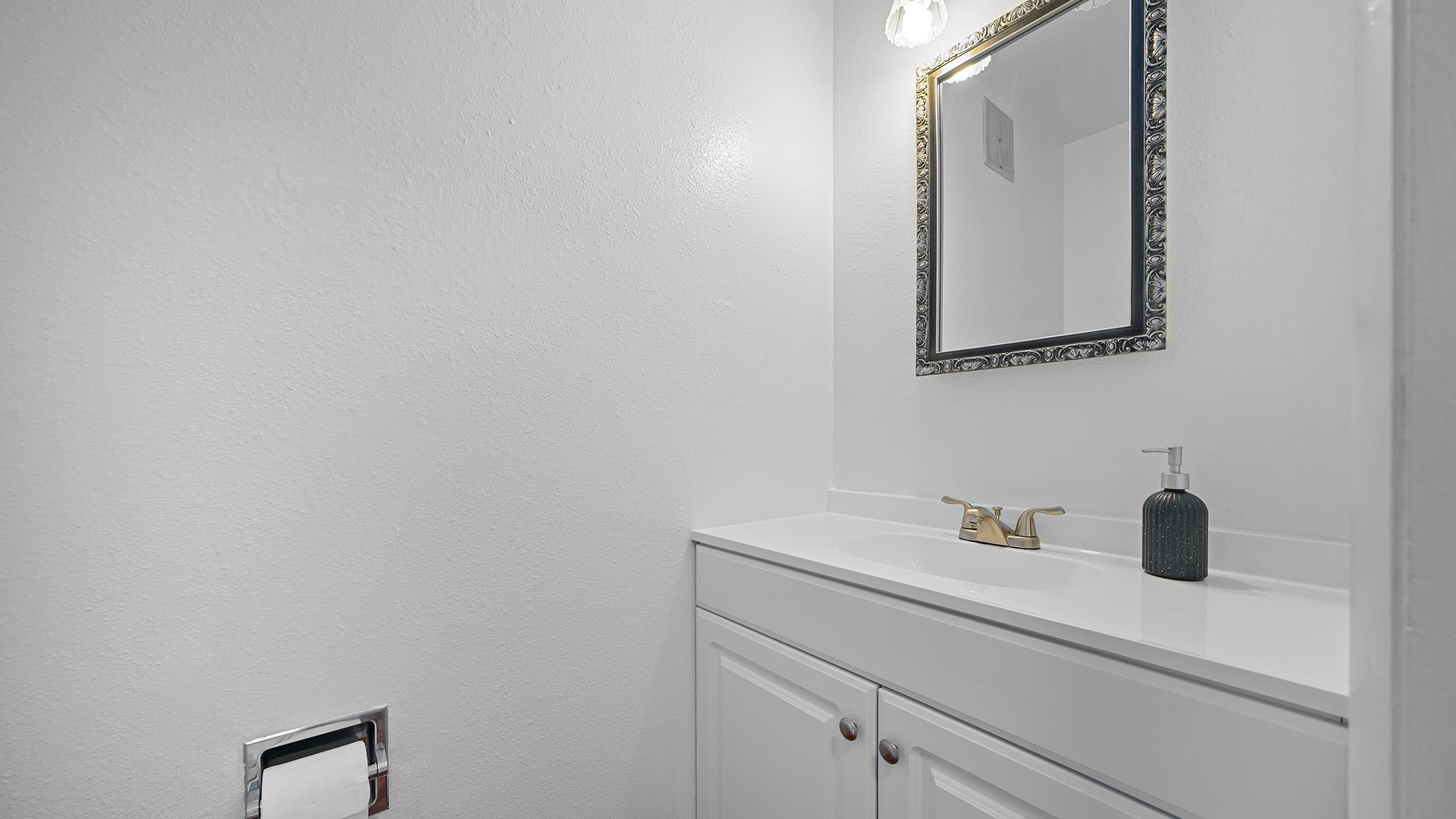 2721 Patterson Road, Unit 903 Grand Junction, CO 81506 - Photo 13 of 22 a bathroom with a sink and a mirror
