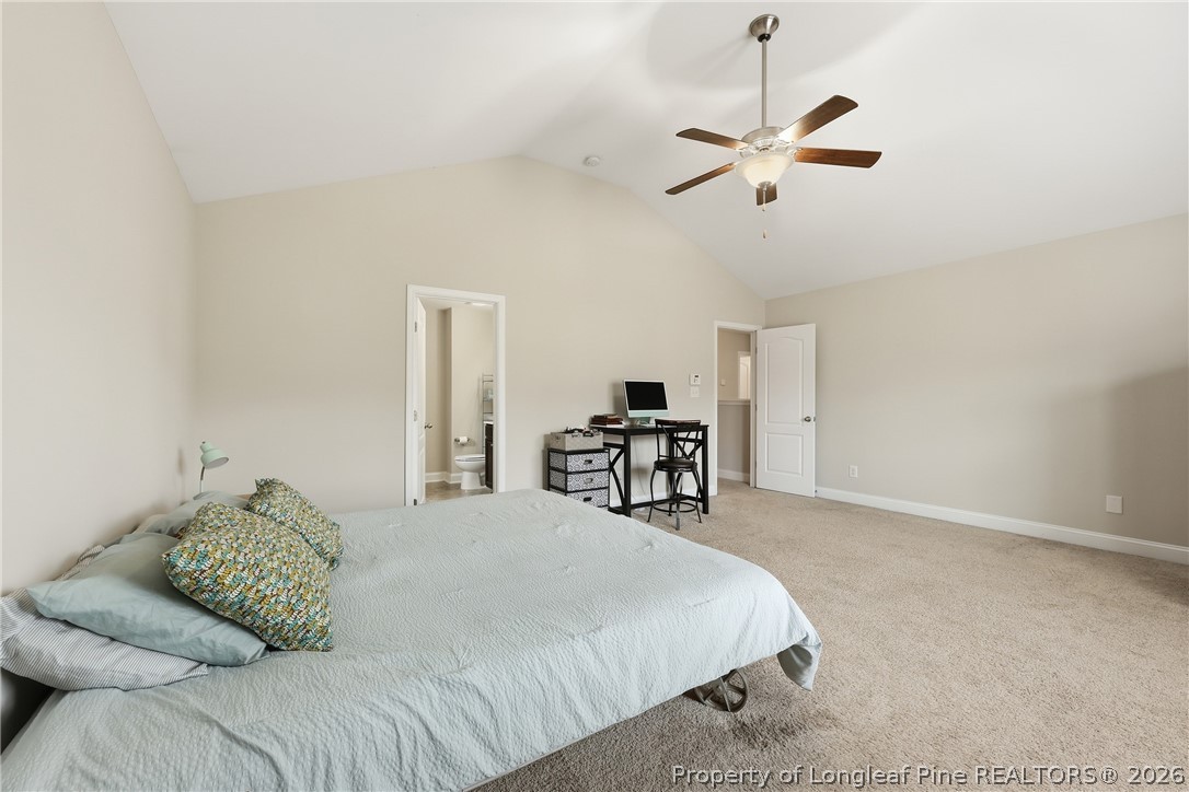 183 Cooper Creek Avenue Spring Lake, NC 28390 - Photo 25 of 34 a bedroom with a bed and ceiling fan