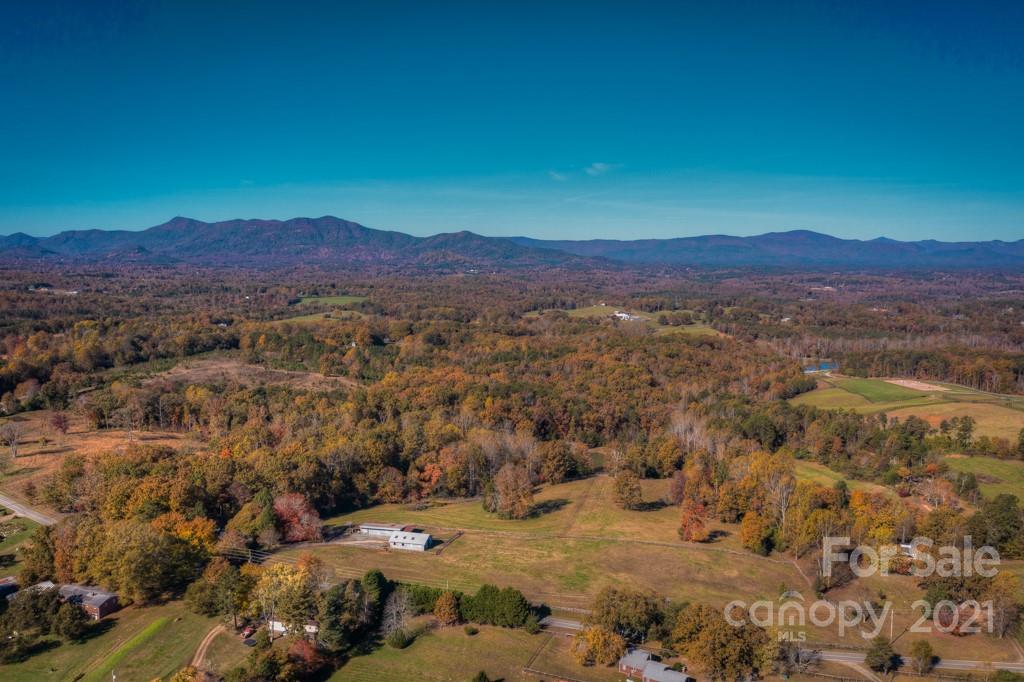 197 Turner Road Tryon, NC 28782 - Photo 1 of 45 a view of a city with mountains in the background