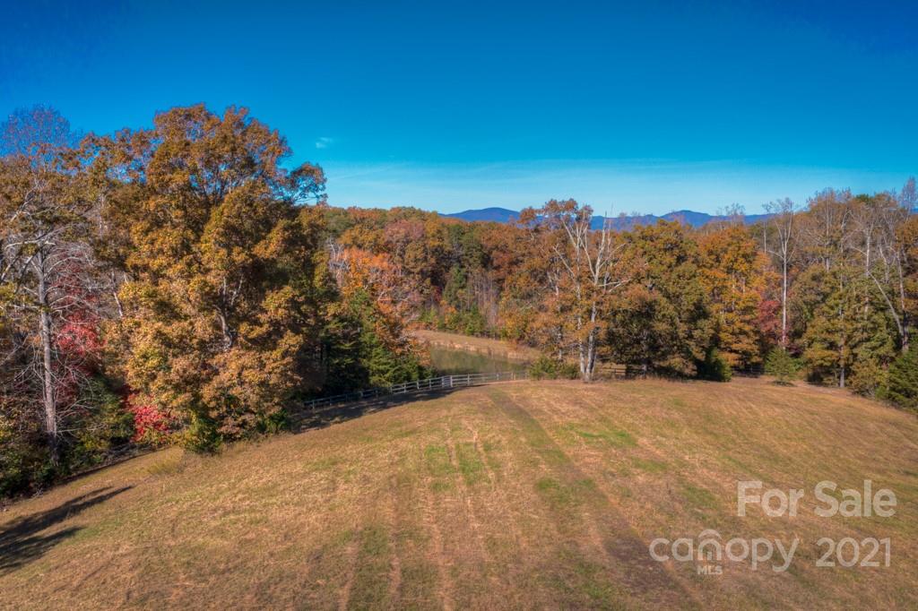 197 Turner Road Tryon, NC 28782 - Photo 14 of 45 a view of a large mountain with sunset in the background