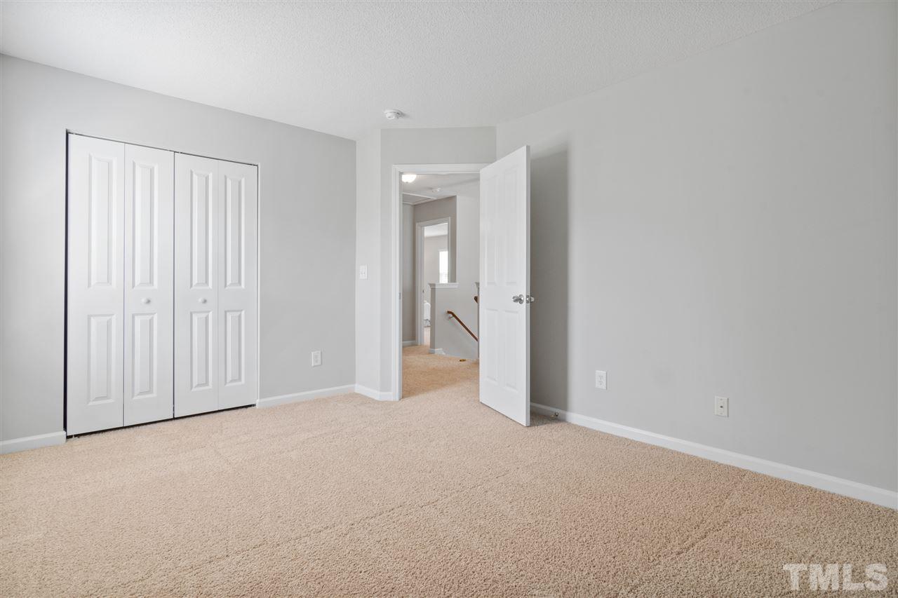 6852 Harter Court Raleigh, NC 27610 - Photo 24 of 29 a view of an empty room and a window