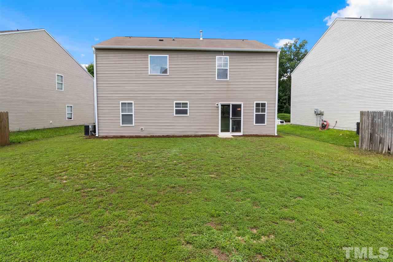6852 Harter Court Raleigh, NC 27610 - Photo 26 of 29 a house view with a garden space