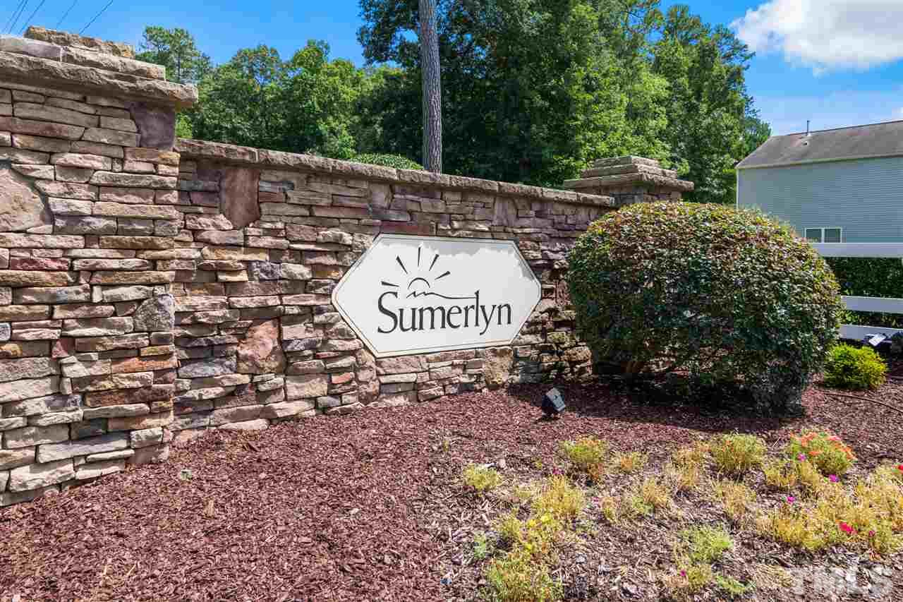 6852 Harter Court Raleigh, NC 27610 - Photo 29 of 29 a view of outdoor space with garden and trees