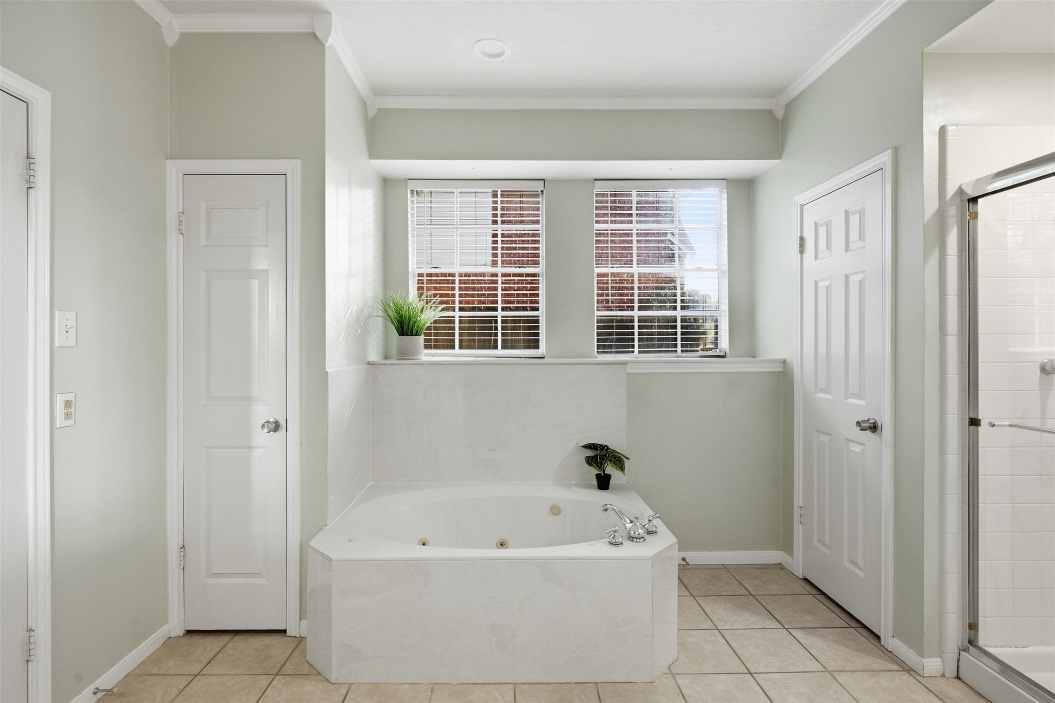 323 Magic Oaks Court Spring, TX 77388 - Photo 25 of 49 Also in the primary bathroom, a jetted bathtub. Imagine soaking off the day in this tub!