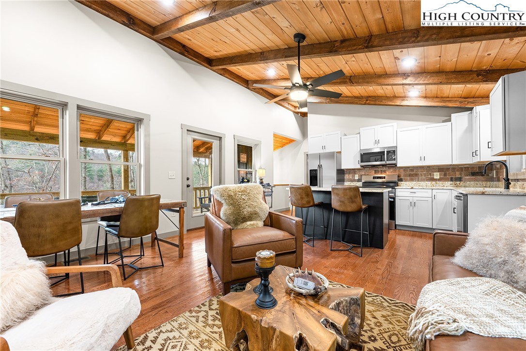 214 Ridge Run Road West Jefferson, NC 28694 - Photo 14 of 49 a living room with furniture kitchen view and a large window