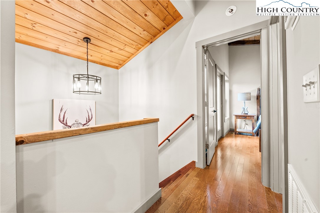 214 Ridge Run Road West Jefferson, NC 28694 - Photo 16 of 49 a view of a hallway view with wooden floor and living room