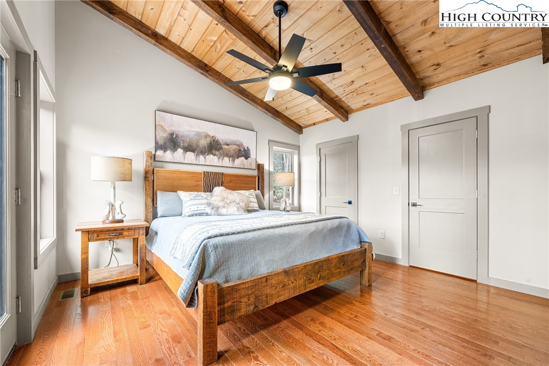 214 Ridge Run Road West Jefferson, NC 28694 - Photo 21 of 49 a bedroom with a bed and a large window