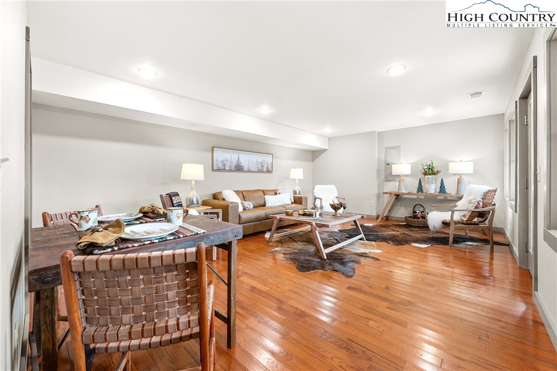 214 Ridge Run Road West Jefferson, NC 28694 - Photo 23 of 49 a living room with furniture a couch and wooden floor