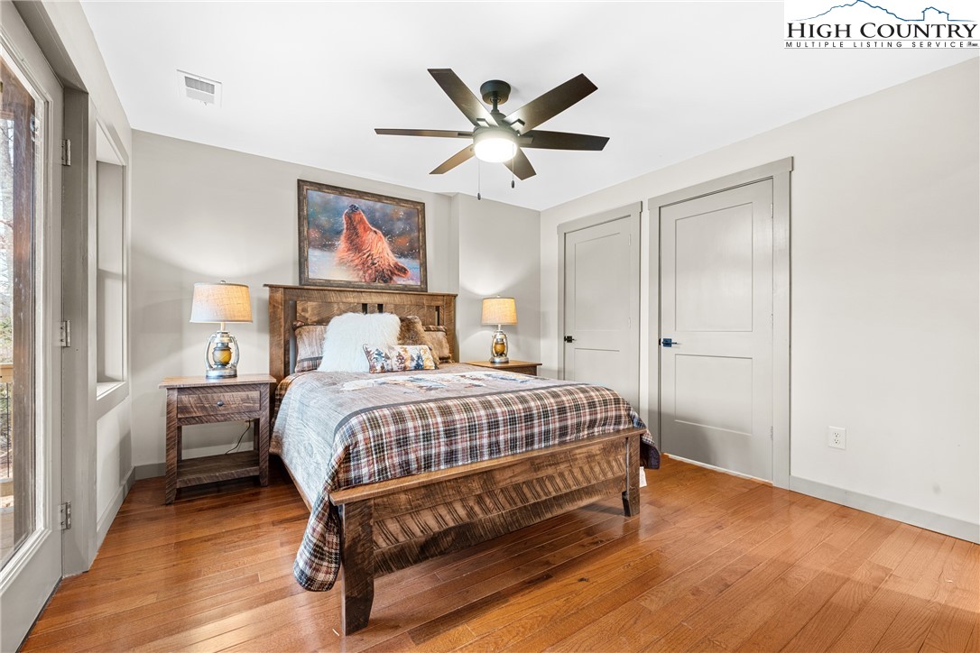 214 Ridge Run Road West Jefferson, NC 28694 - Photo 26 of 49 a bedroom with a bed and window