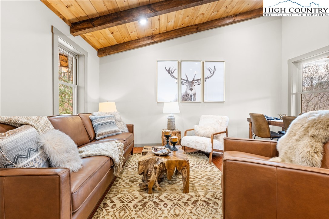 214 Ridge Run Road West Jefferson, NC 28694 - Photo 3 of 49 a living room with furniture and a window