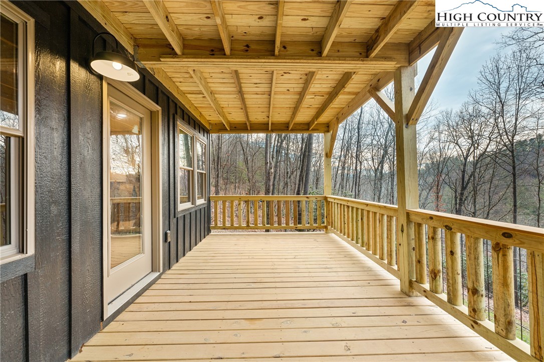 214 Ridge Run Road West Jefferson, NC 28694 - Photo 32 of 49 a view of a balcony with wooden floor