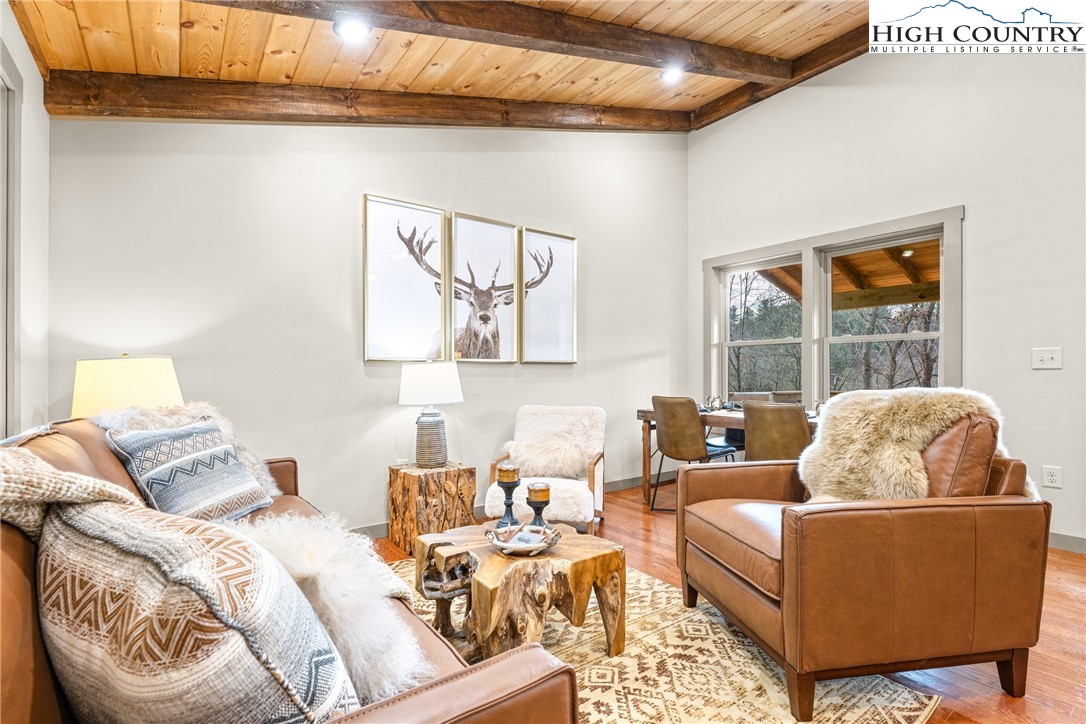 214 Ridge Run Road West Jefferson, NC 28694 - Photo 4 of 49 a living room with furniture and a window