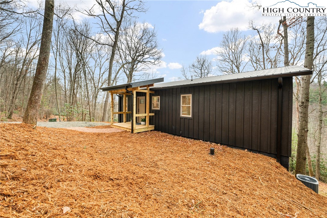 214 Ridge Run Road West Jefferson, NC 28694 - Photo 43 of 49 a house view with a outdoor space