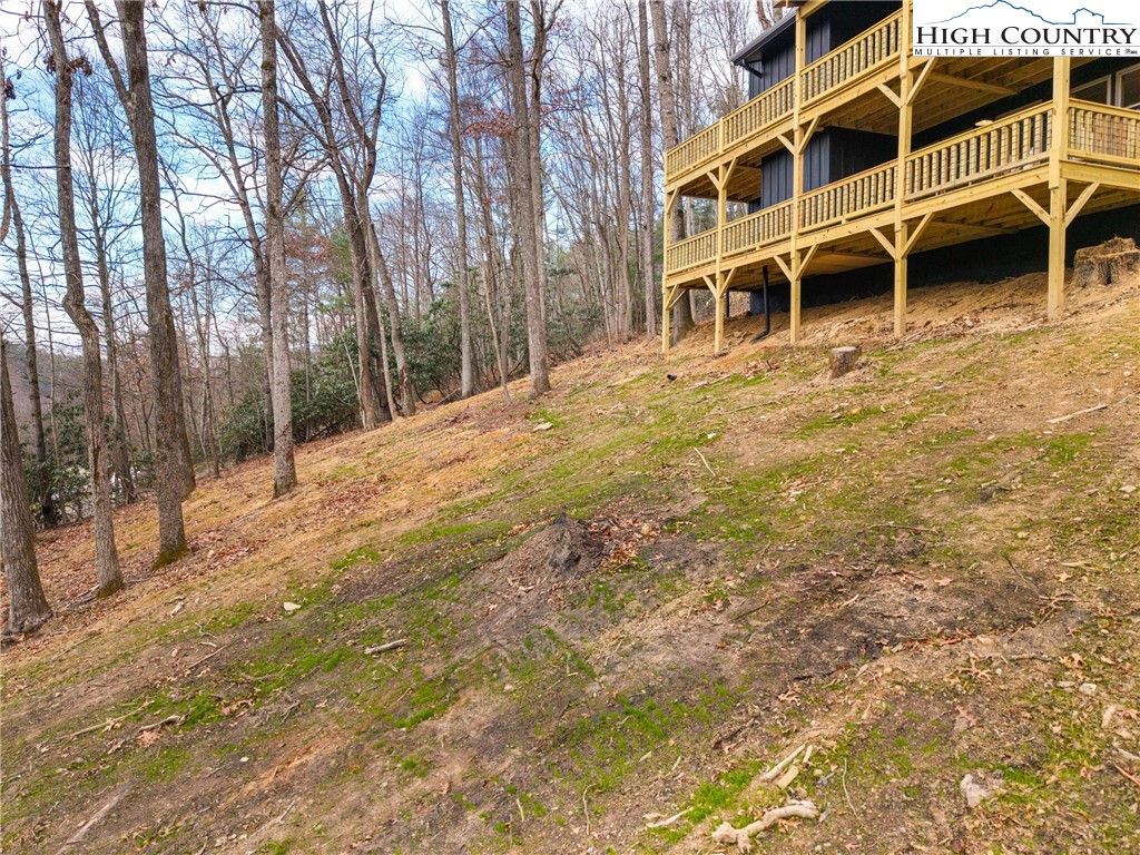 214 Ridge Run Road West Jefferson, NC 28694 - Photo 46 of 49 a view of a large building with large trees