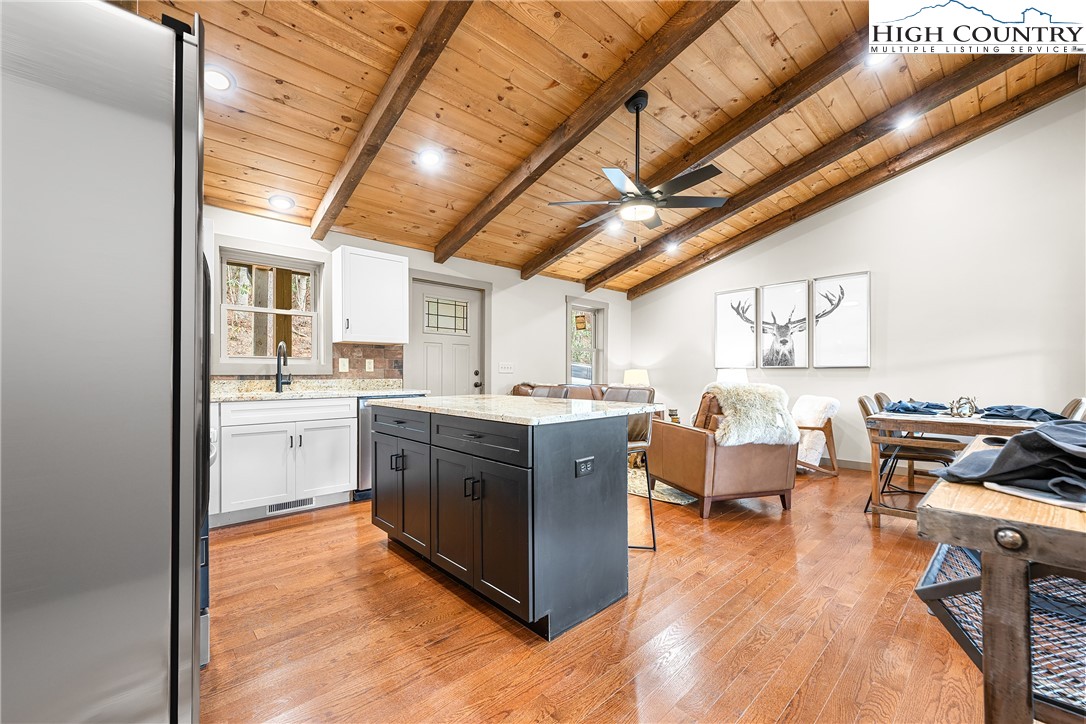 214 Ridge Run Road West Jefferson, NC 28694 - Photo 7 of 49 a kitchen with stainless steel appliances granite countertop lots of counter top space