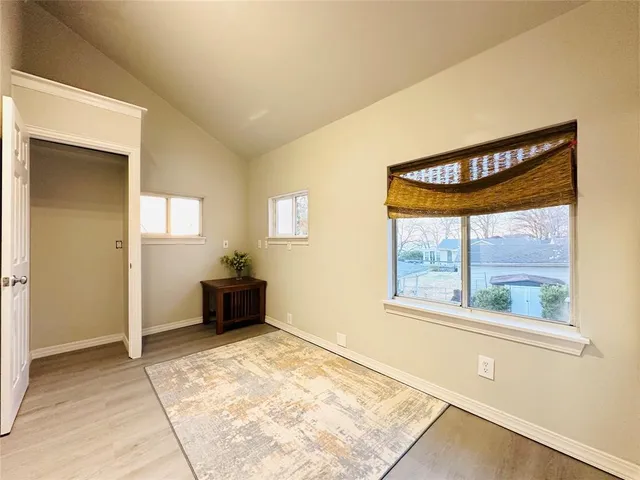 an empty room with windows