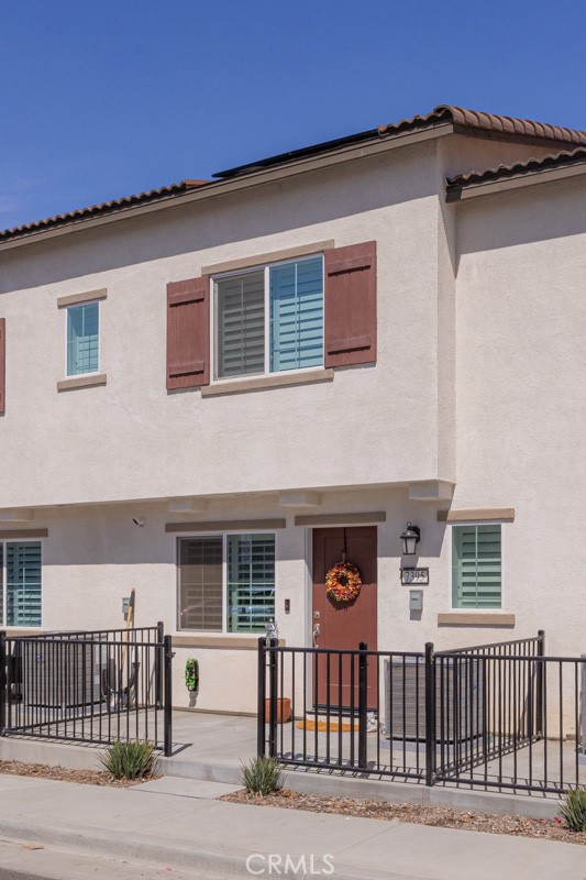7395 Olive Grv Street Riverside, CA 92507 - Photo 14 of 18 a front view of a house with stairs