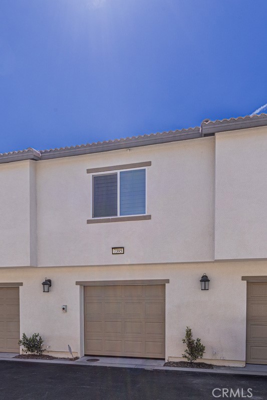 7395 Olive Grv Street Riverside, CA 92507 - Photo 15 of 18 Attached garage with direct access.