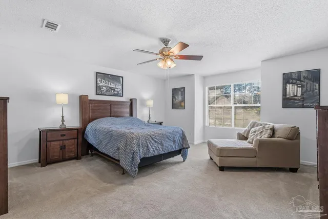 a bathroom with a tub sink and a shower