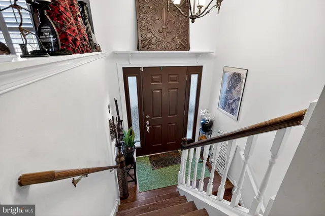 a view of entryway with wooden floor