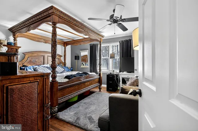 a view of a dining room with furniture and window