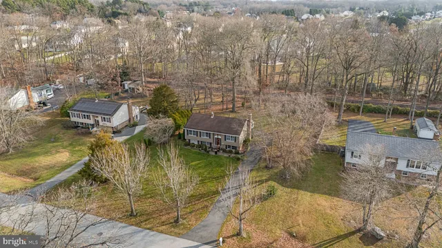 a aerial view of residential houses with outdoor space