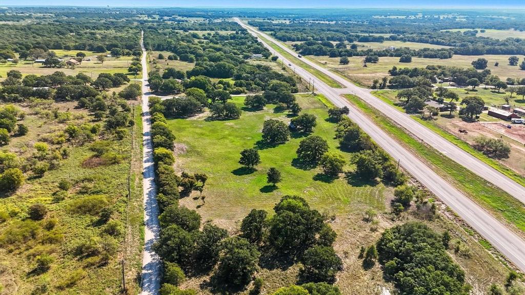 120 Longbranch Road Nocona, TX 76255 - Photo 15 of 23 an aerial view of residential houses with outdoor space