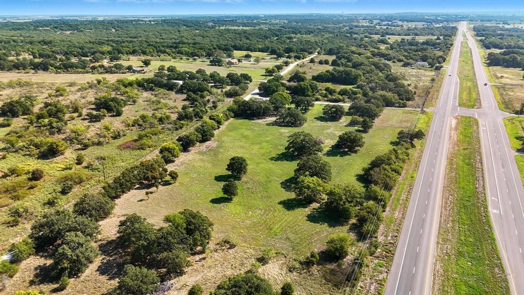 120 Longbranch Road Nocona, TX 76255 - Photo 16 of 23 an aerial view of residential houses with outdoor space