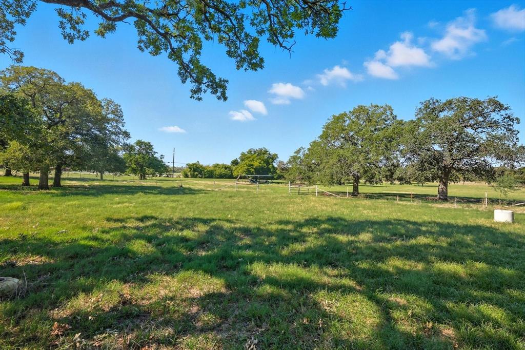 120 Longbranch Road Nocona, TX 76255 - Photo 21 of 23 a view of a golf course with a lake view