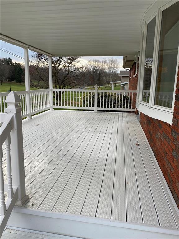 2079 Boyd School Road Wampum, PA 16157 - Photo 19 of 22 FRONT PORCH IN MAINTENANCE FREE VINYL