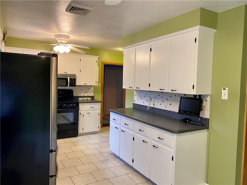 2079 Boyd School Road Wampum, PA 16157 - Photo 5 of 22 GREAT COUNTER SPACE AND TV