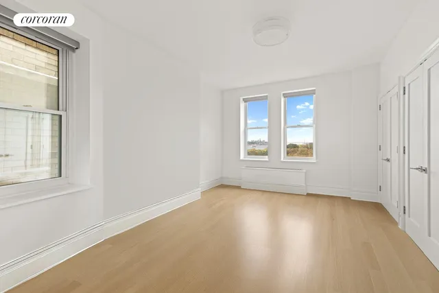 a media room with lots of chairs and a projector