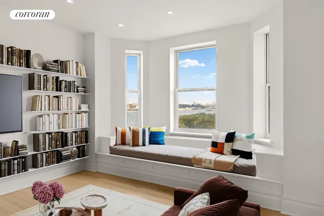 a bedroom with bed and a window