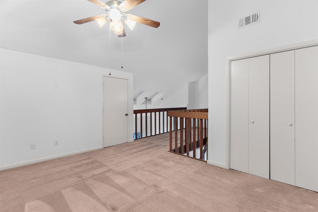 1048 Signal Ridge Place Rockwall, TX 75032 - Photo 25 of 40 a view of a hallway with a chandelier fan